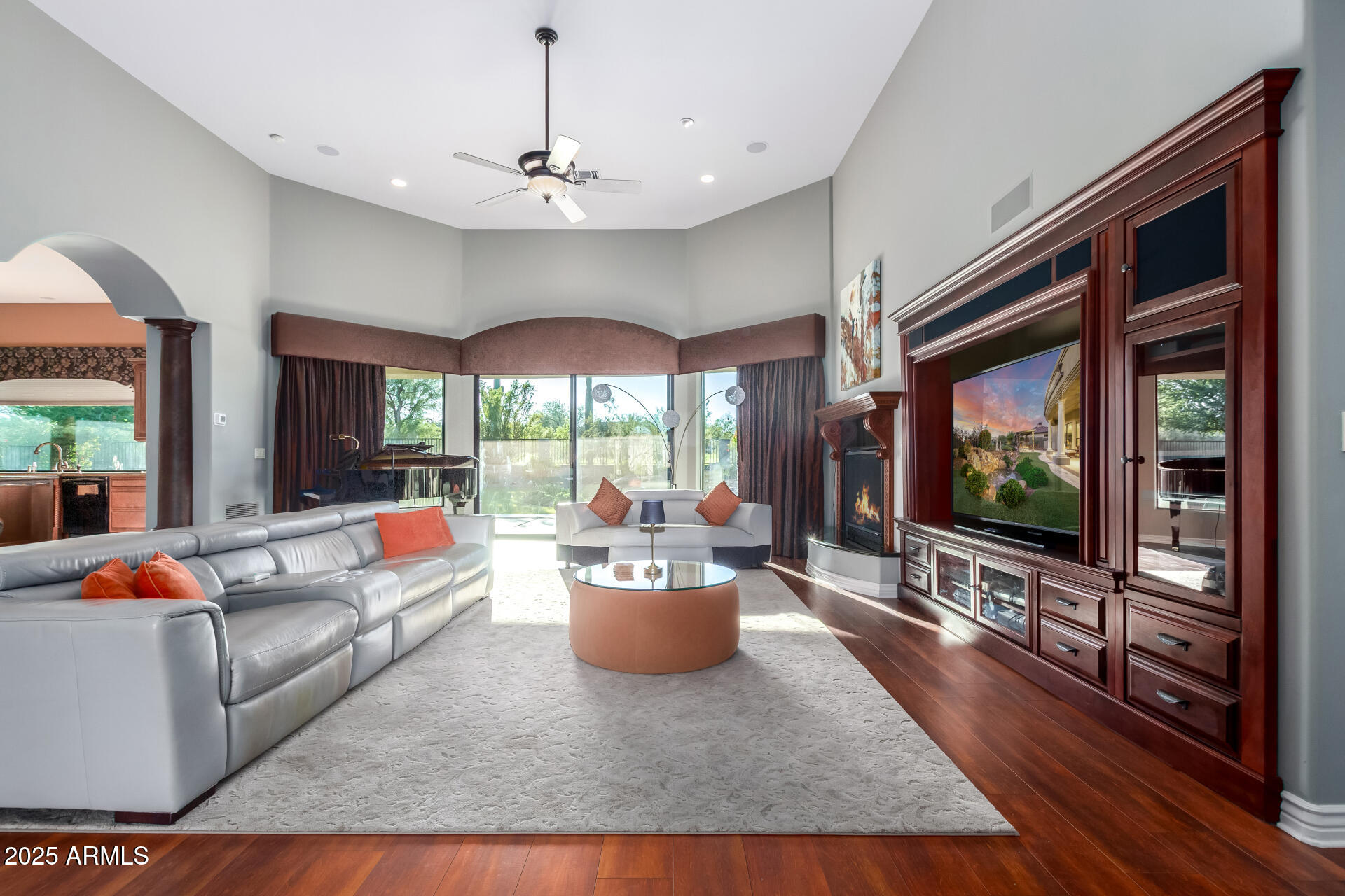 27314 North Azatlan Drive Rio Verde, AZ 85263 - Photo 11 of 62 a living room with furniture and a flat screen tv
