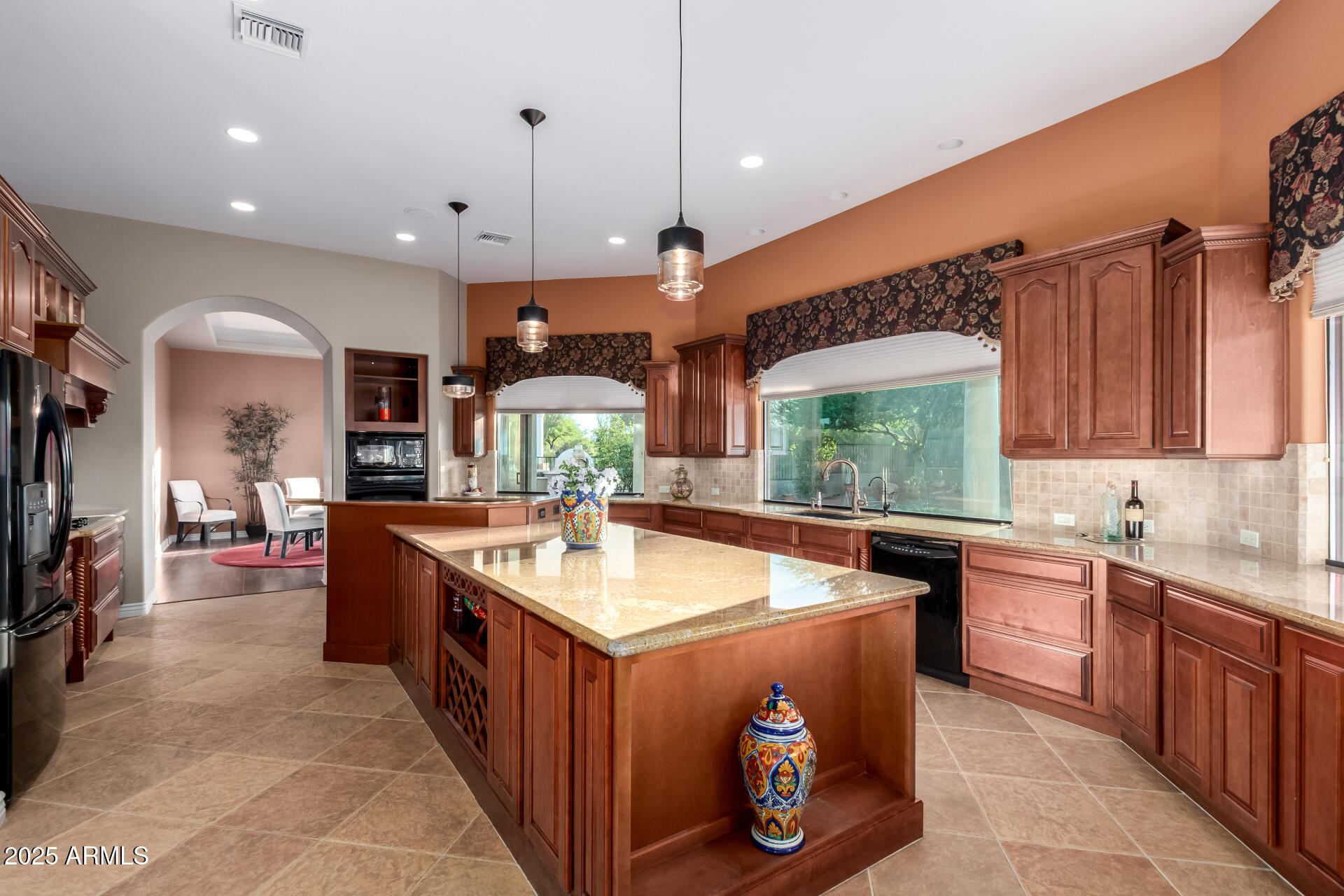 27314 North Azatlan Drive Rio Verde, AZ 85263 - Photo 19 of 62 a kitchen with stainless steel appliances granite countertop a sink and a refrigerator