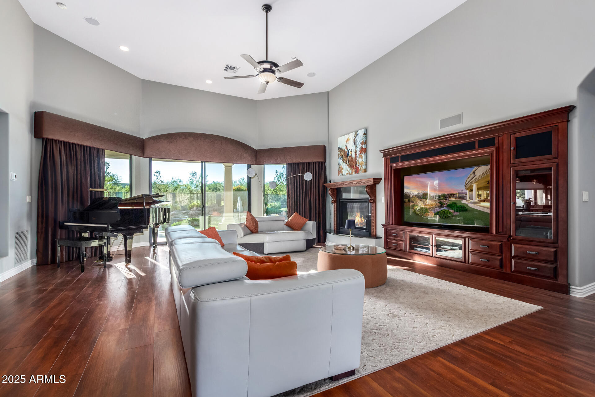 27314 North Azatlan Drive Rio Verde, AZ 85263 - Photo 2 of 62 a living room with furniture and a flat screen tv