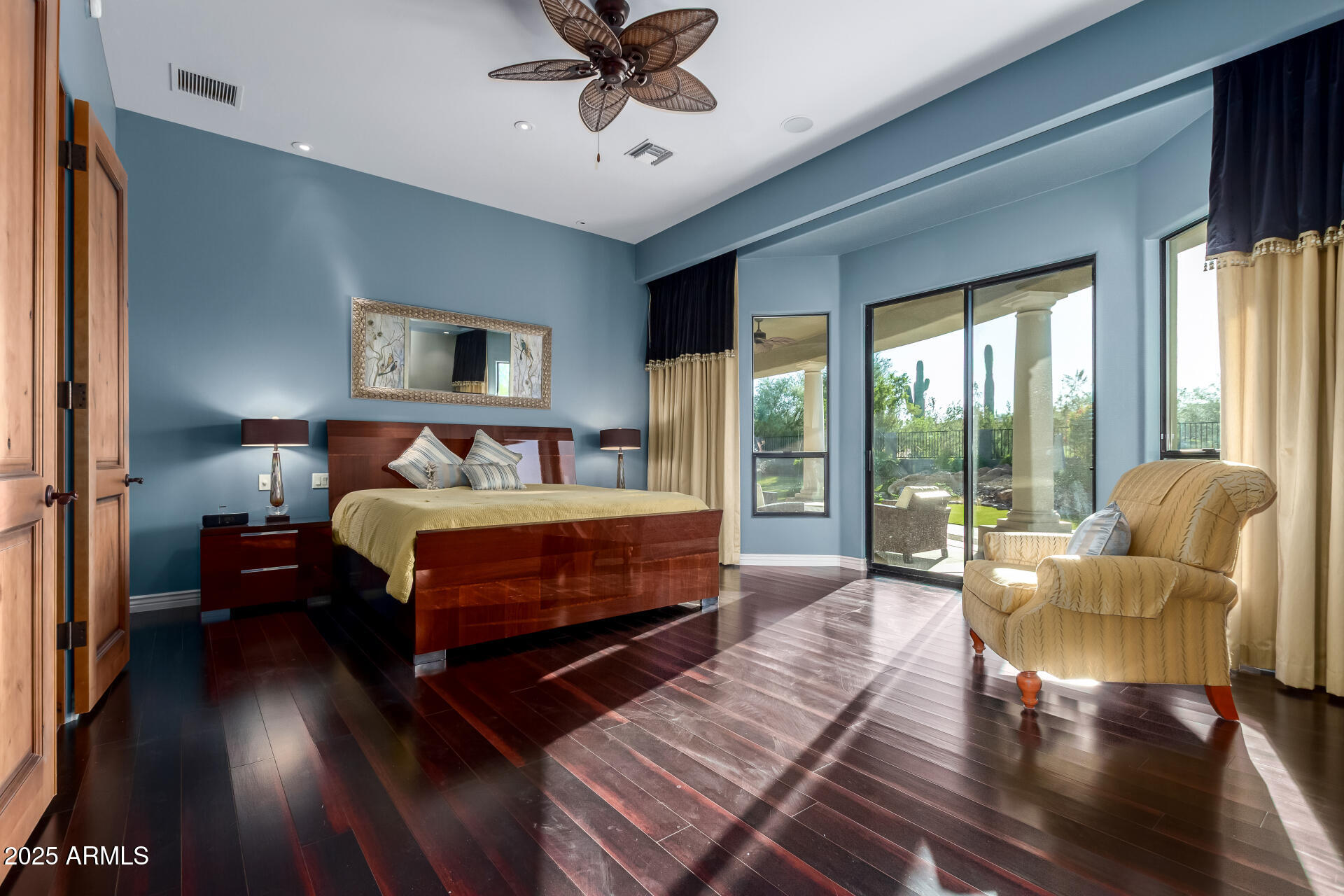 27314 North Azatlan Drive Rio Verde, AZ 85263 - Photo 23 of 62 a bedroom with a bed and a couch