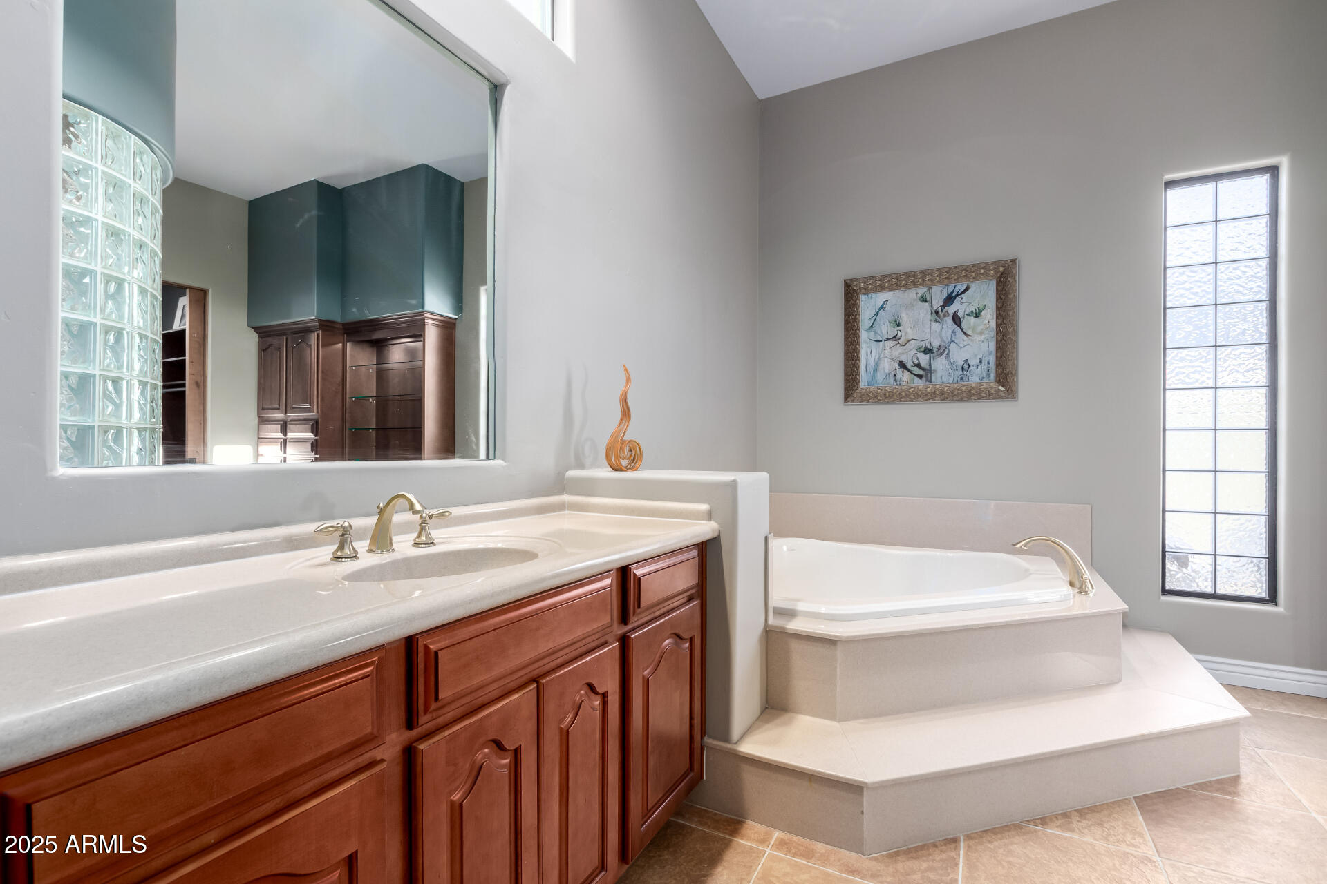 27314 North Azatlan Drive Rio Verde, AZ 85263 - Photo 26 of 62 a bathroom with a sink and a mirror
