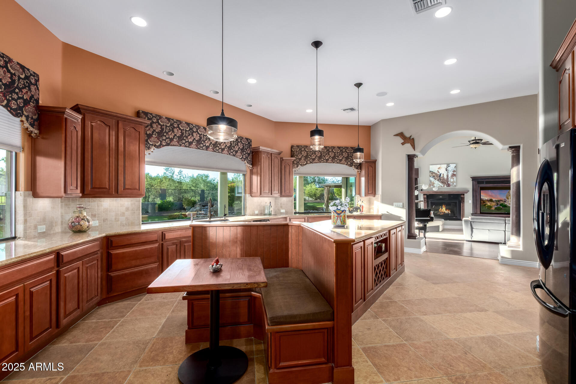27314 North Azatlan Drive Rio Verde, AZ 85263 - Photo 3 of 62 a large kitchen with stainless steel appliances a large counter top a stove a sink and a refrigerator