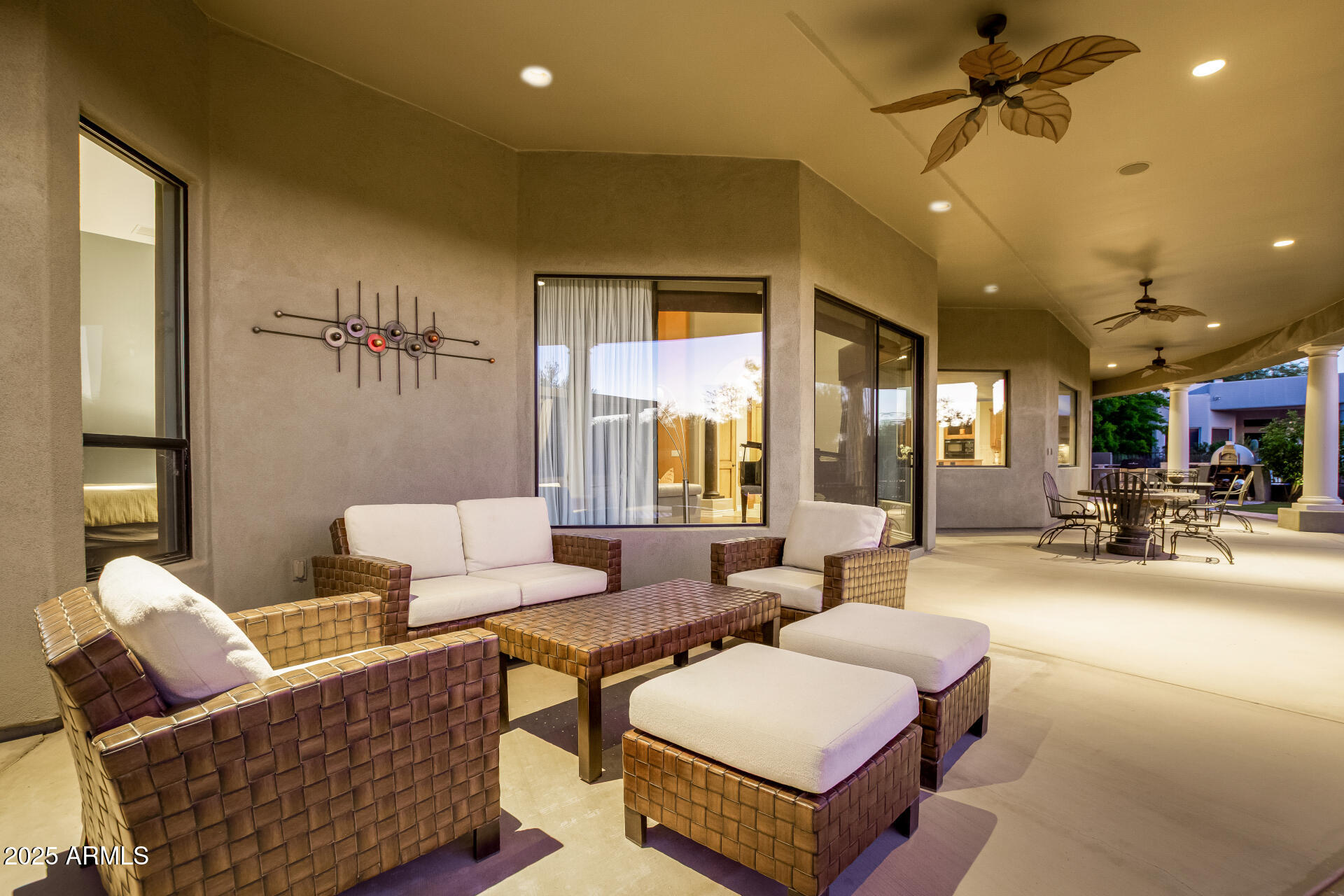 27314 North Azatlan Drive Rio Verde, AZ 85263 - Photo 36 of 62 a living room with furniture and a chandelier