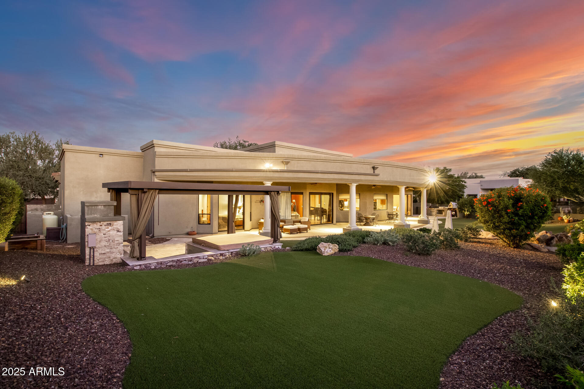 27314 North Azatlan Drive Rio Verde, AZ 85263 - Photo 40 of 62 a view of a house with backyard porch and sitting area