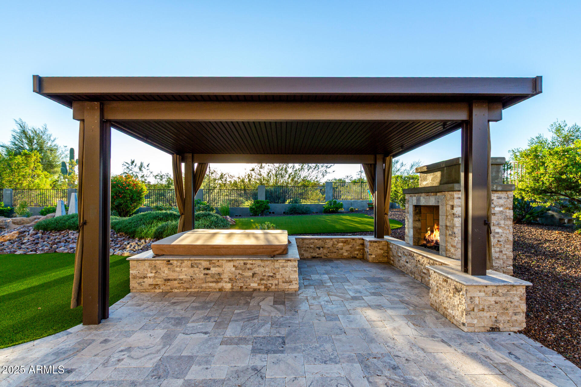 27314 North Azatlan Drive Rio Verde, AZ 85263 - Photo 48 of 62 a view of patio with a table chairs potted plants and a palm tree