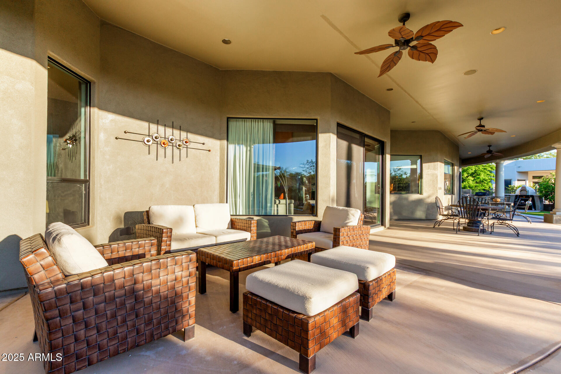 27314 North Azatlan Drive Rio Verde, AZ 85263 - Photo 49 of 62 a living room with furniture and a large window