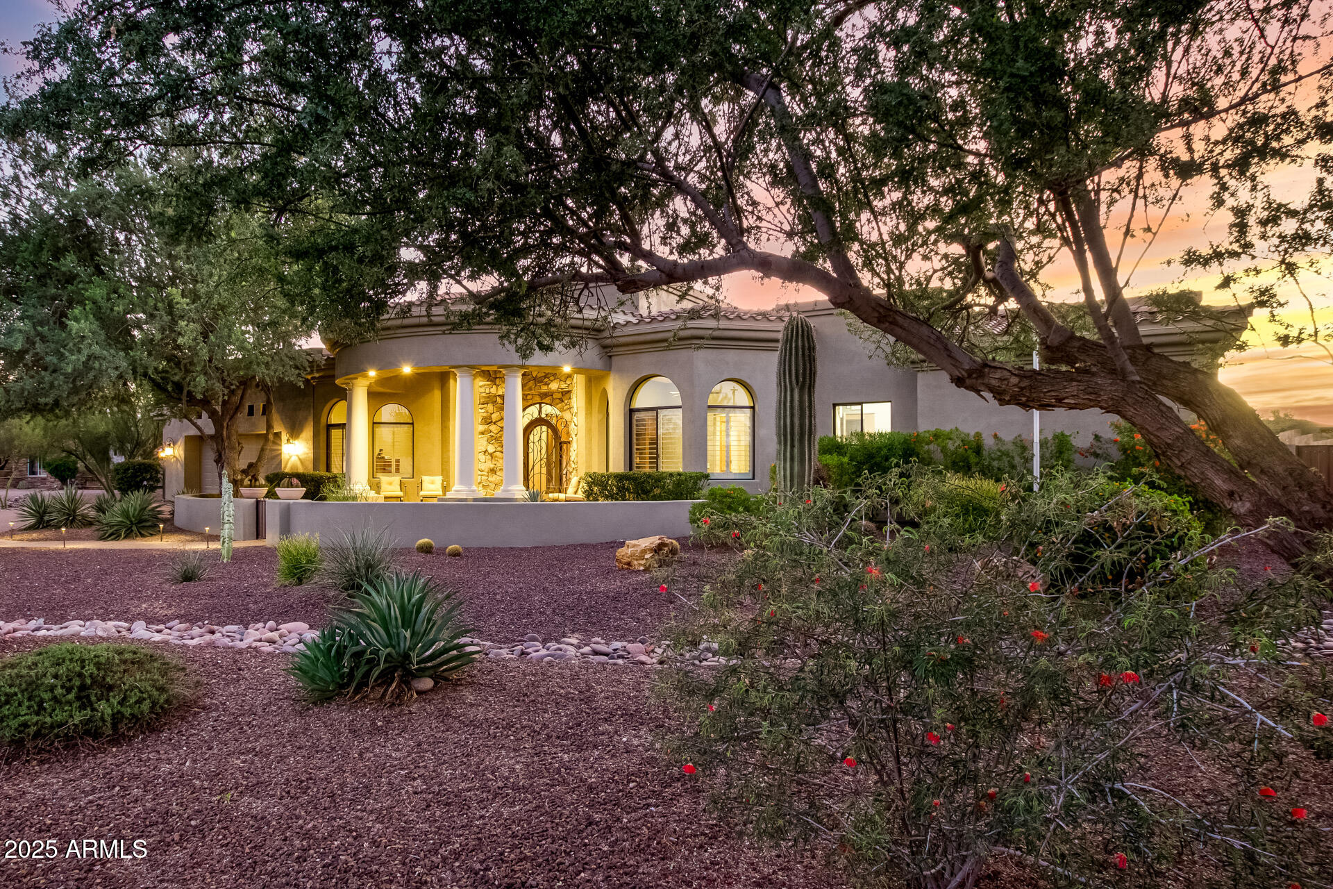 27314 North Azatlan Drive Rio Verde, AZ 85263 - Photo 6 of 62 a front view of a house with garden