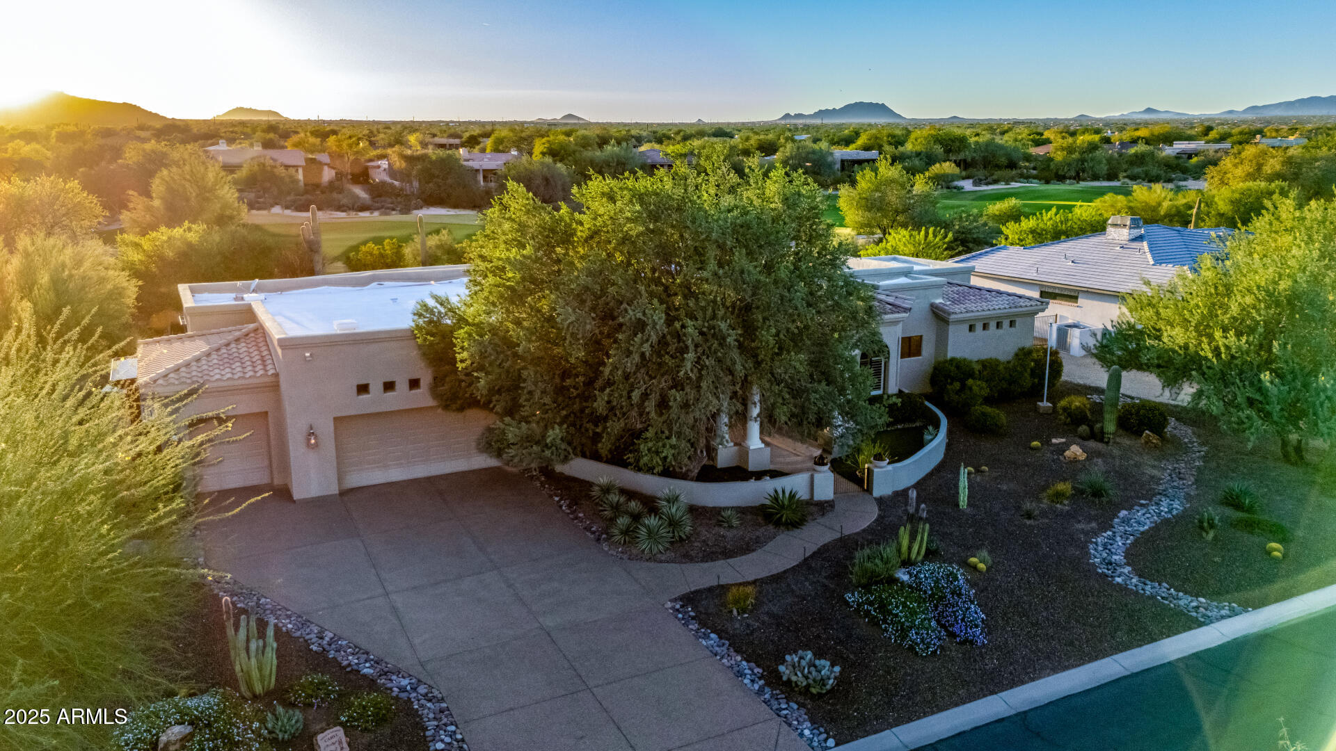 27314 North Azatlan Drive Rio Verde, AZ 85263 - Photo 62 of 62 an aerial view of a house with a yard and lake view