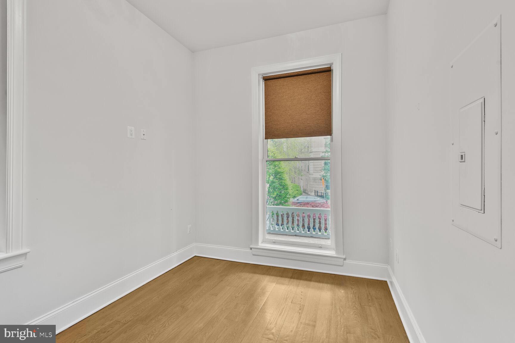 2009 Columbia Road Northwest, Unit 3 Washington, DC 20009 - Photo 9 of 16 an empty room with a window
