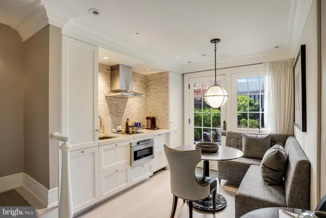 a view of a dining room with furniture window and outside view