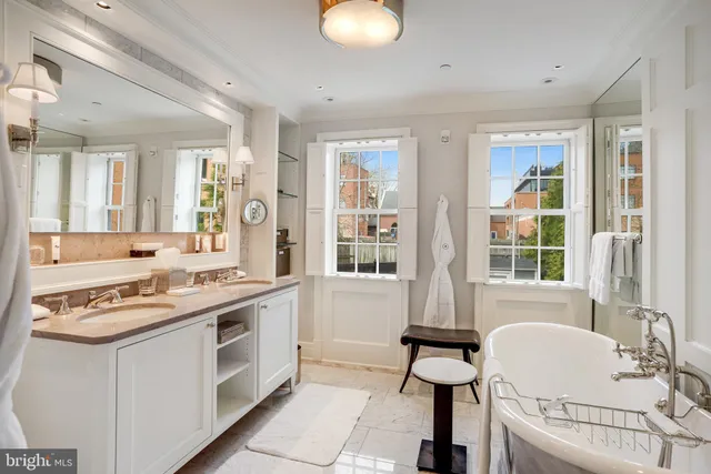 a kitchen with stainless steel appliances granite countertop a stove and a sink