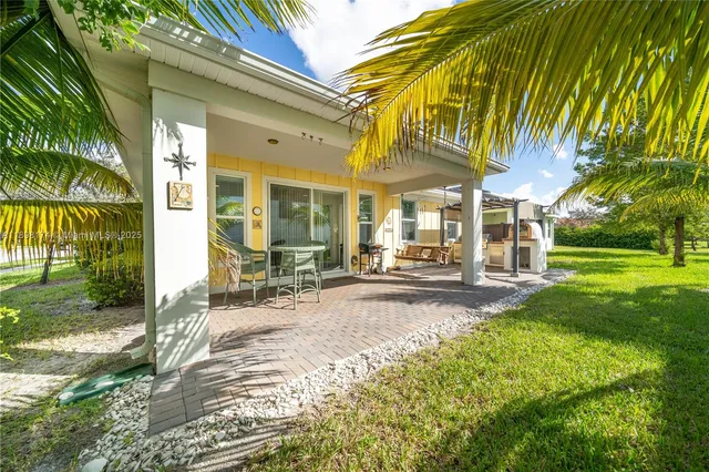 a view of a building with a yard