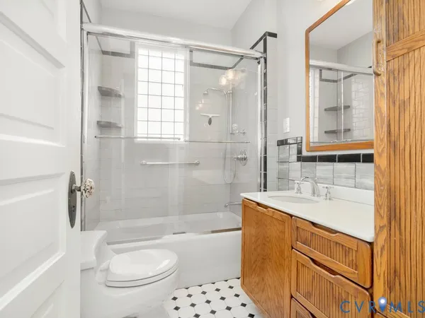 a view of a street with a building in the background