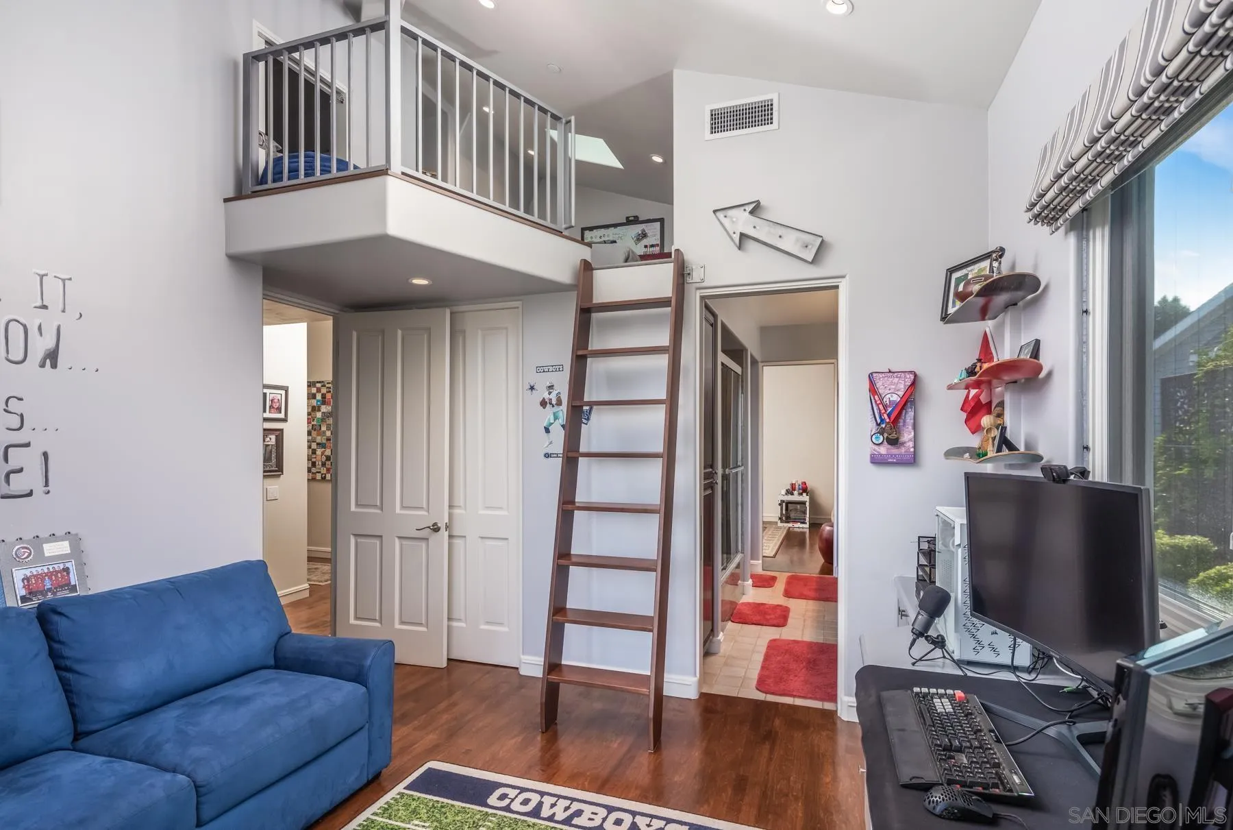 1375 Este Vista Court Encinitas, CA 92024 - Photo 16 of 31 a view of livingroom with hardwood floor and workspace