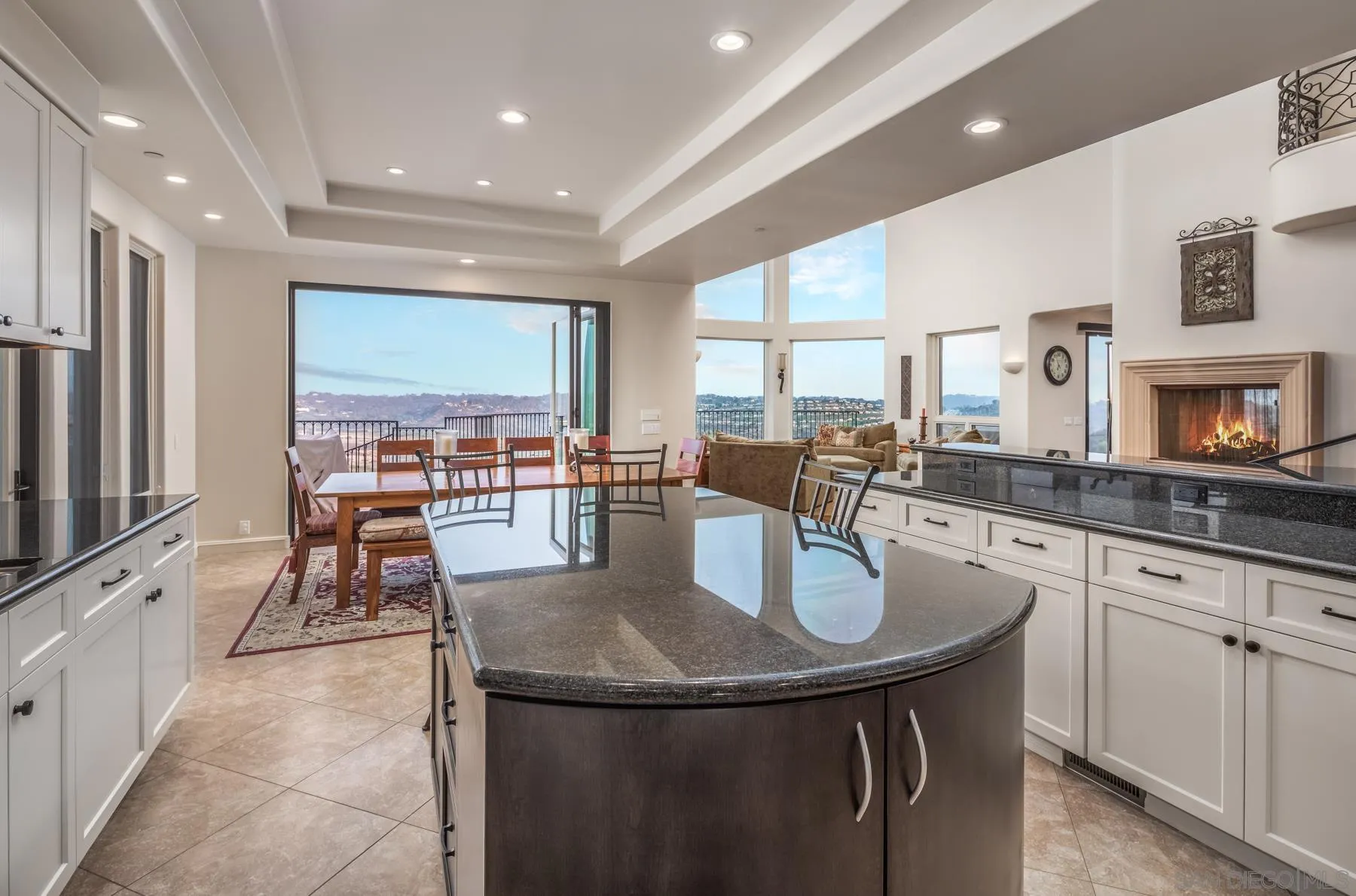 1375 Este Vista Court Encinitas, CA 92024 - Photo 6 of 31 a kitchen with stainless steel appliances granite countertop a sink a stove and a center island