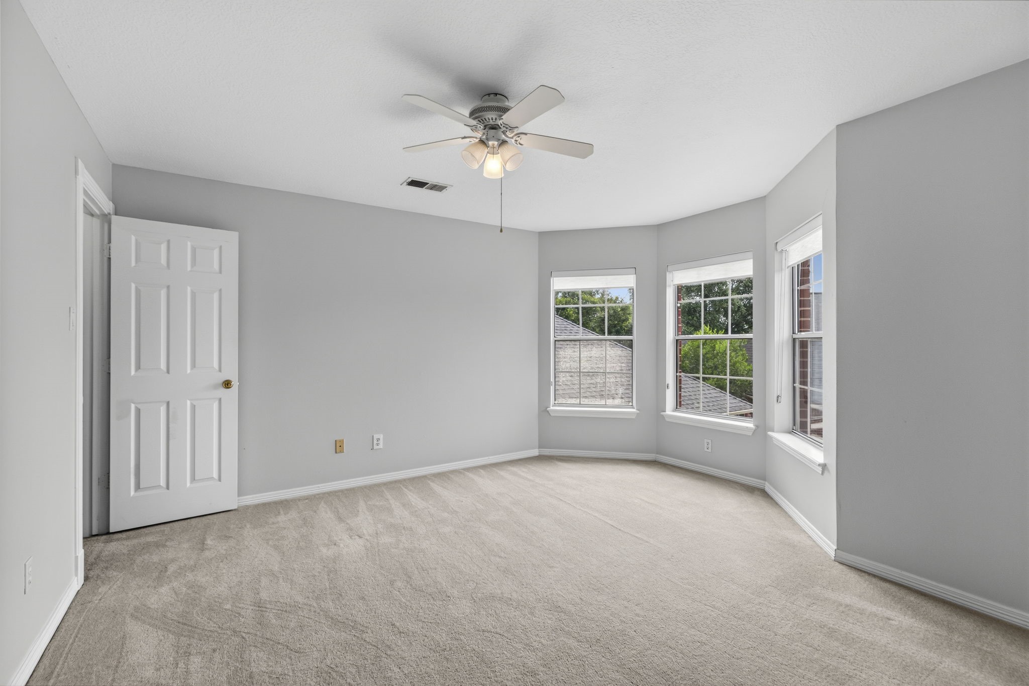18310 Pamela Way Spring, TX 77379 - Photo 34 of 42 Oversized upstairs bedroom featuring an abundance of natural light through the bay window feature.