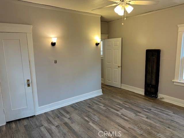 1025 Locust Avenue Long Beach, CA 90813 - Photo 21 of 64 an empty room with wooden floor and mirror