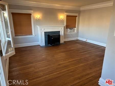 1025 Locust Avenue Long Beach, CA 90813 - Photo 26 of 64 a view of empty room with wooden floor and fireplace