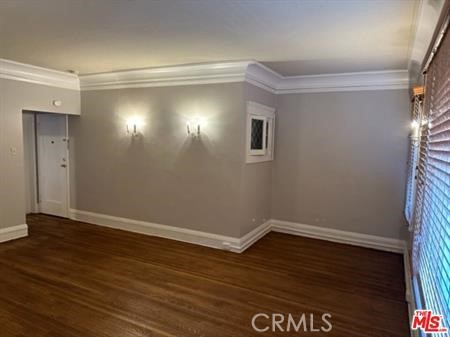 1025 Locust Avenue Long Beach, CA 90813 - Photo 27 of 64 a view of an empty room with wooden floor and a window