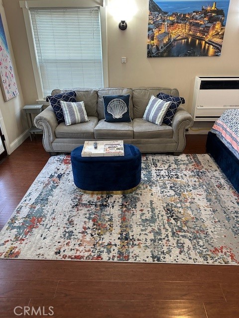 1025 Locust Avenue Long Beach, CA 90813 - Photo 34 of 64 a living room with furniture and a wooden floor