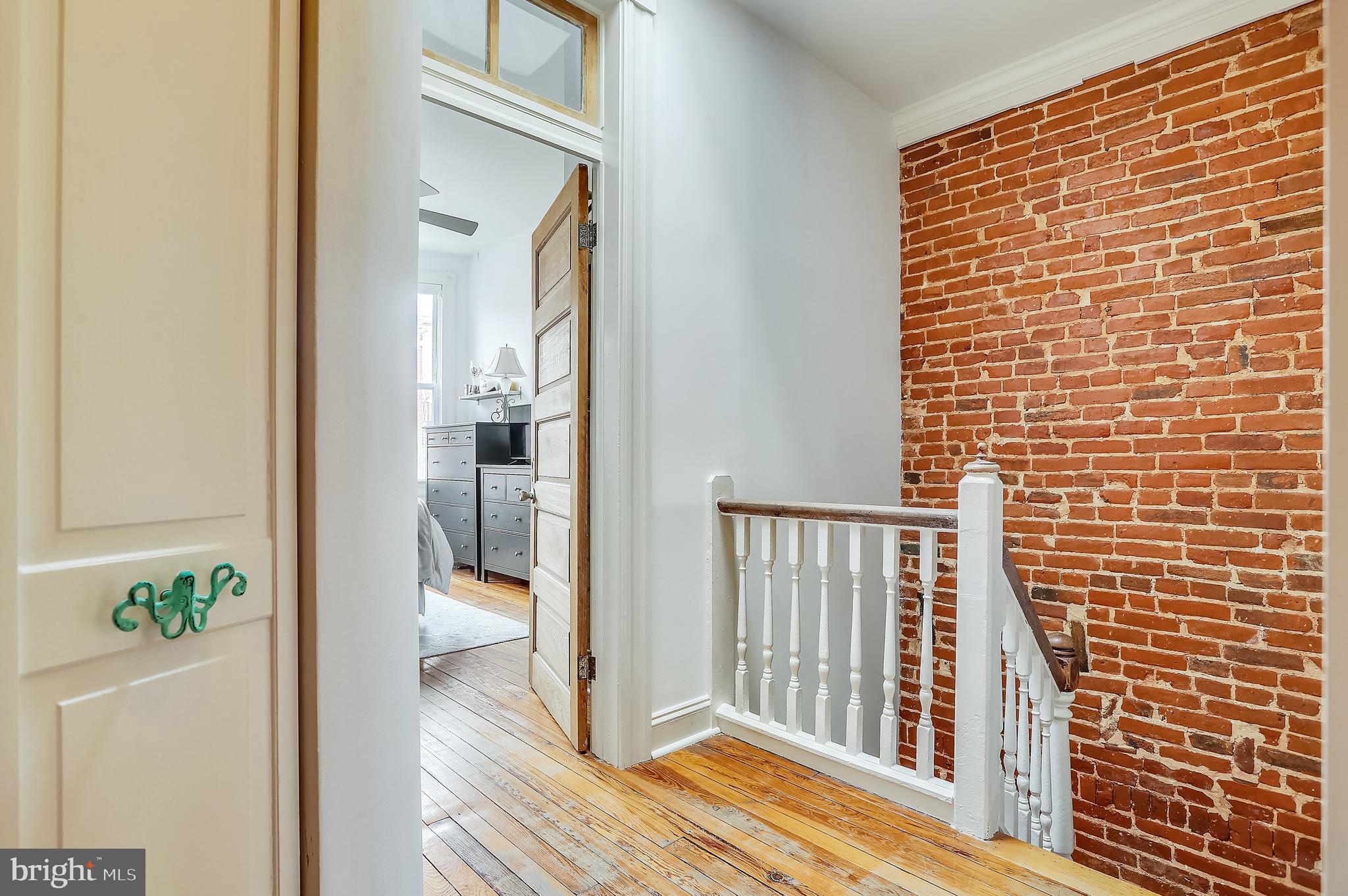 1420 Riverside Avenue Baltimore, MD 21230 - Photo 19 of 73 Second floor with exposed brick and skylight