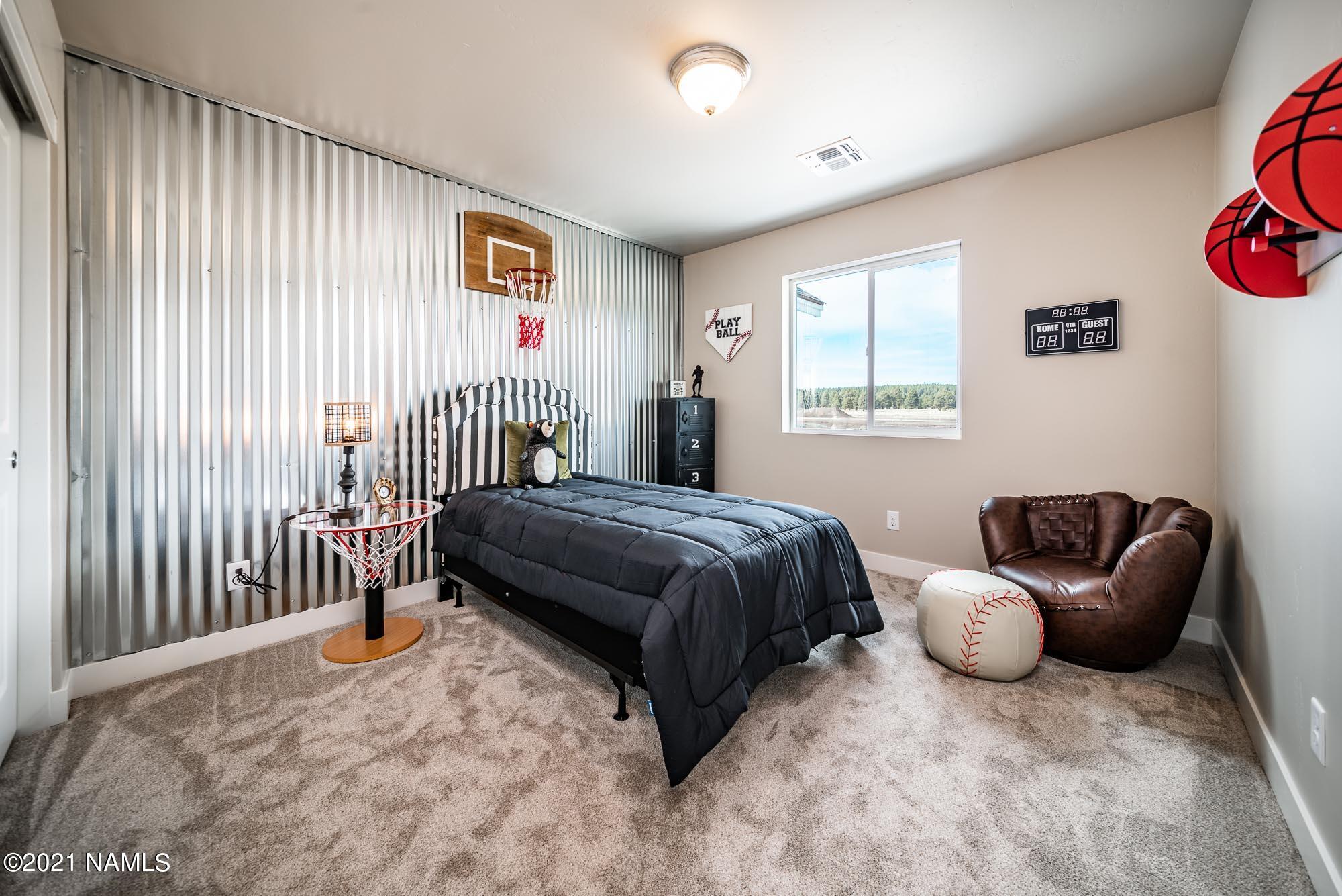 12209 Solid Rock Drive Bellemont, AZ 86015 - Photo 25 of 31 BEDROOM 2