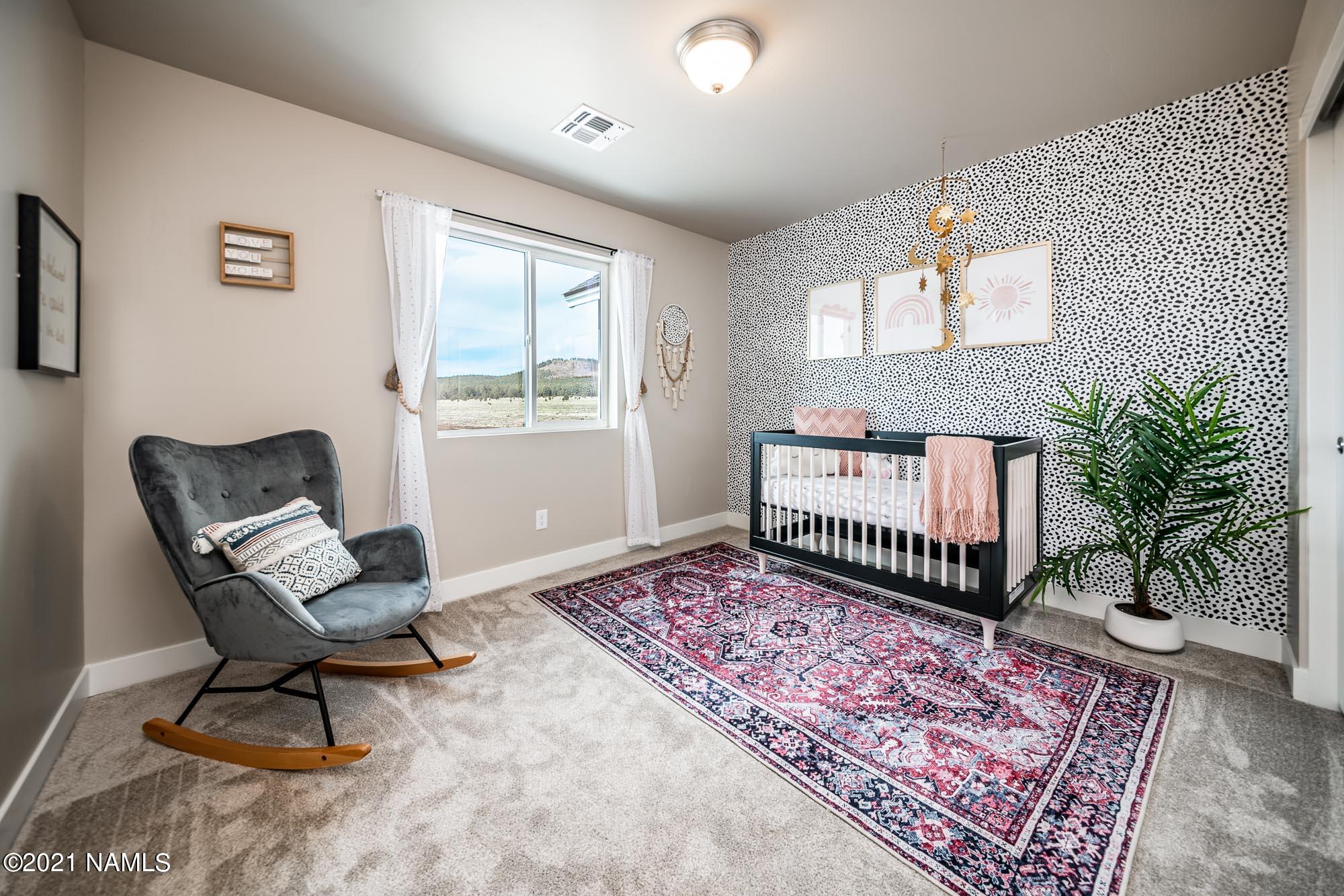 12209 Solid Rock Drive Bellemont, AZ 86015 - Photo 26 of 31 BEDROOM 3