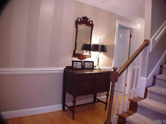 8804 Wellsley Way Raleigh, NC 27613 - Photo 2 of 10 a view of a hallway with workspace