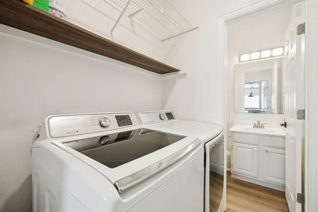 a utility room with dryer and washer
