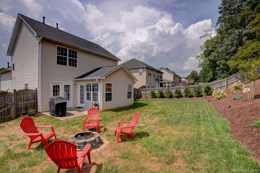 87 Yadkin Road Fletcher, NC 28732 - Photo 5 of 34 a view of backyard of the house