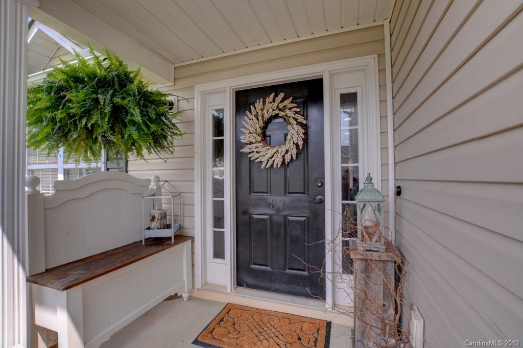 87 Yadkin Road Fletcher, NC 28732 - Photo 9 of 34 a view of a entryway door of the house