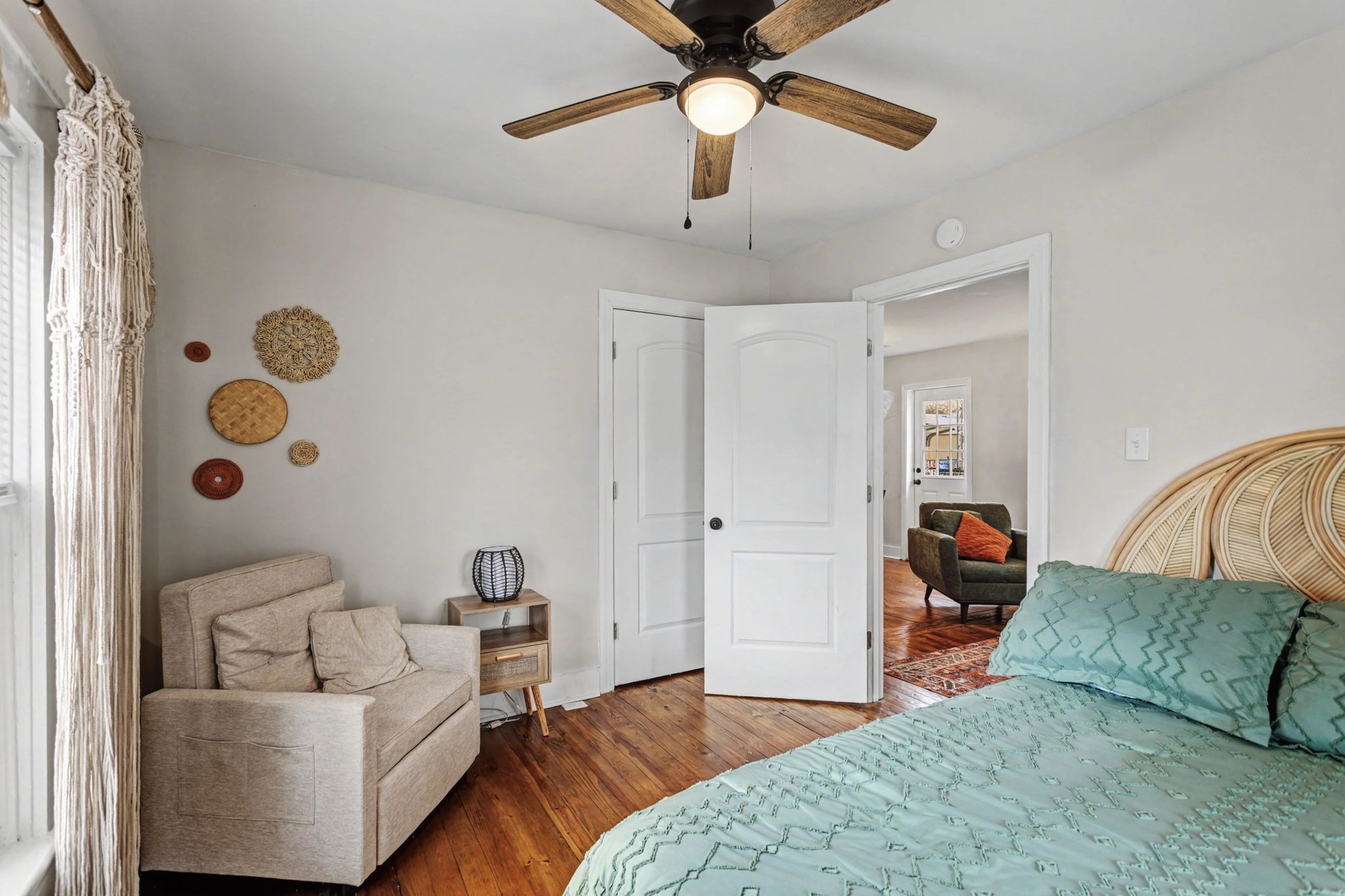 511 Florida Avenue Mount Pleasant, TN 38474 - Photo 20 of 28 a bedroom with furniture and a chandelier