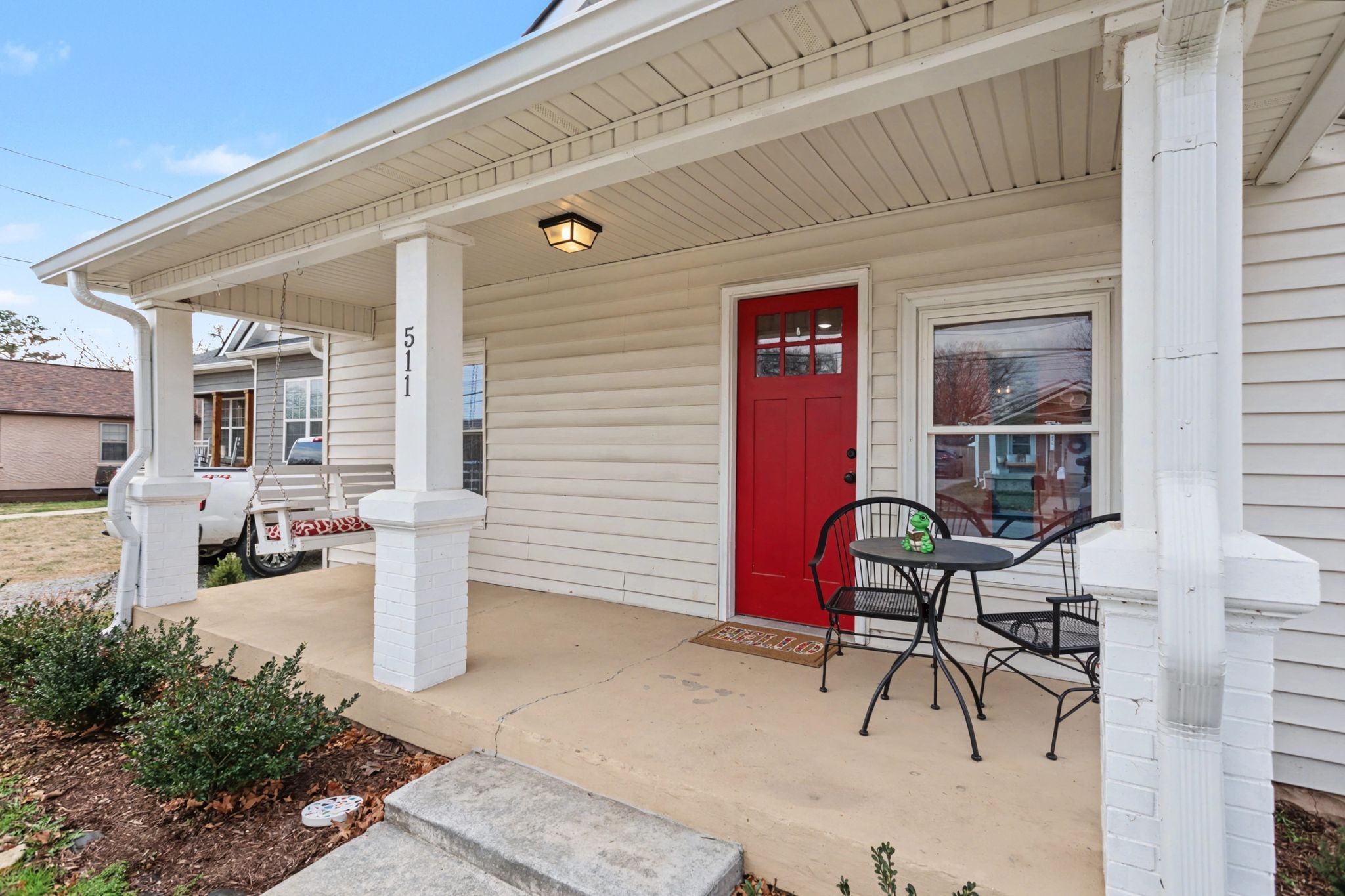 511 Florida Avenue Mount Pleasant, TN 38474 - Photo 3 of 28 a front view of a house with chairs