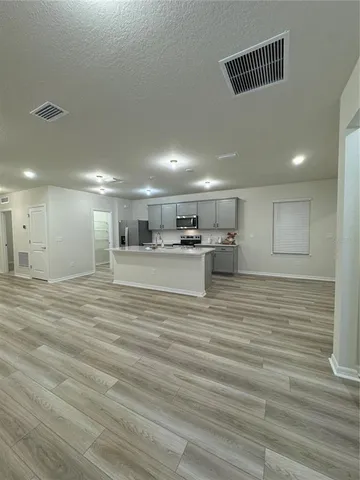 a view of kitchen and kitchen island