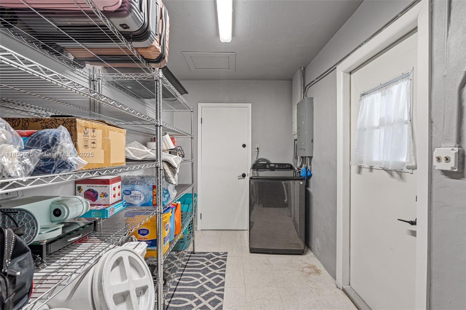 10450 Southwest 43rd Street Miami, FL 33165 - Photo 18 of 43 a view of storage and utility room