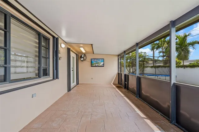 a view of hallway with a large window