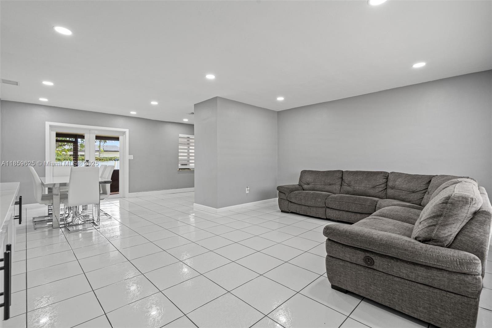 10450 Southwest 43rd Street Miami, FL 33165 - Photo 7 of 43 a living room with furniture