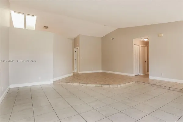 a view of an empty room with window