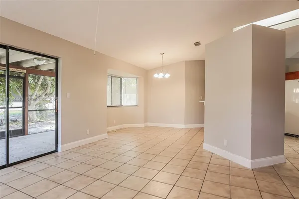 a view of an empty room and window