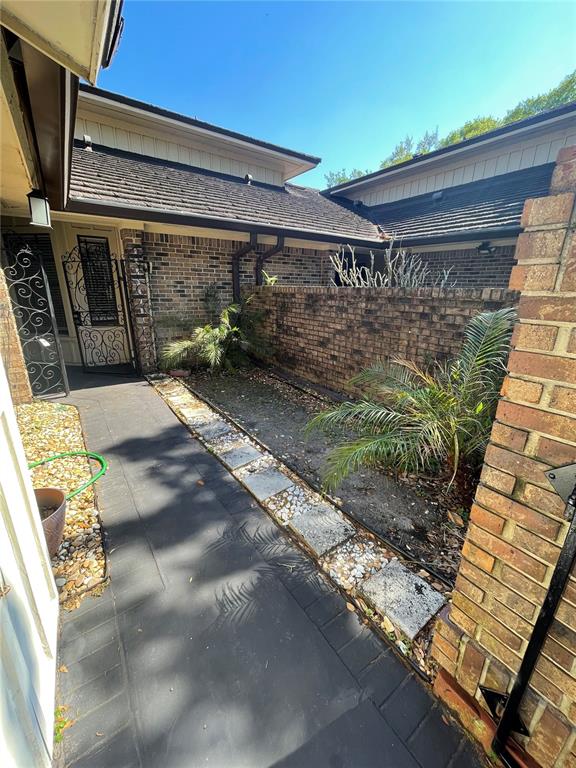 7652 Spring Bay Cove, Unit 3 Orlando, FL 32819 - Photo 3 of 30 a view of backyard with outdoor seating