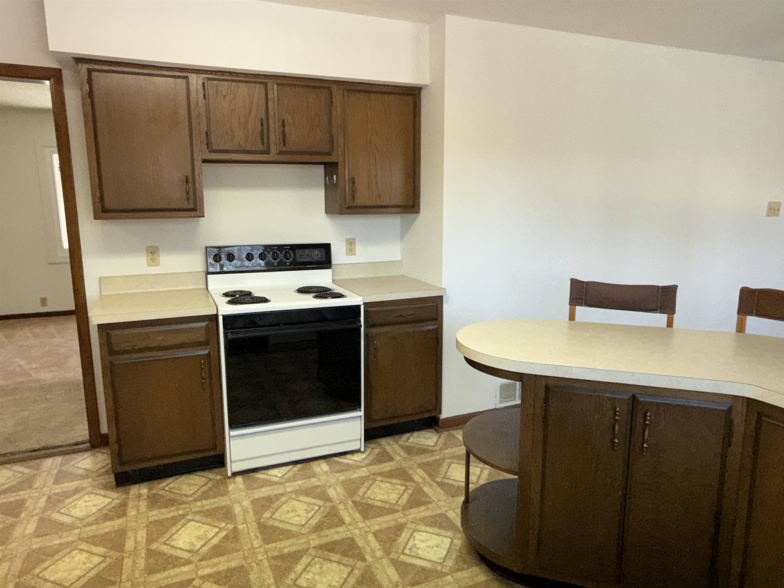 45 South Blackhawk Road Oregon, IL 61061 - Photo 11 of 42 a kitchen with a sink cabinets and appliances