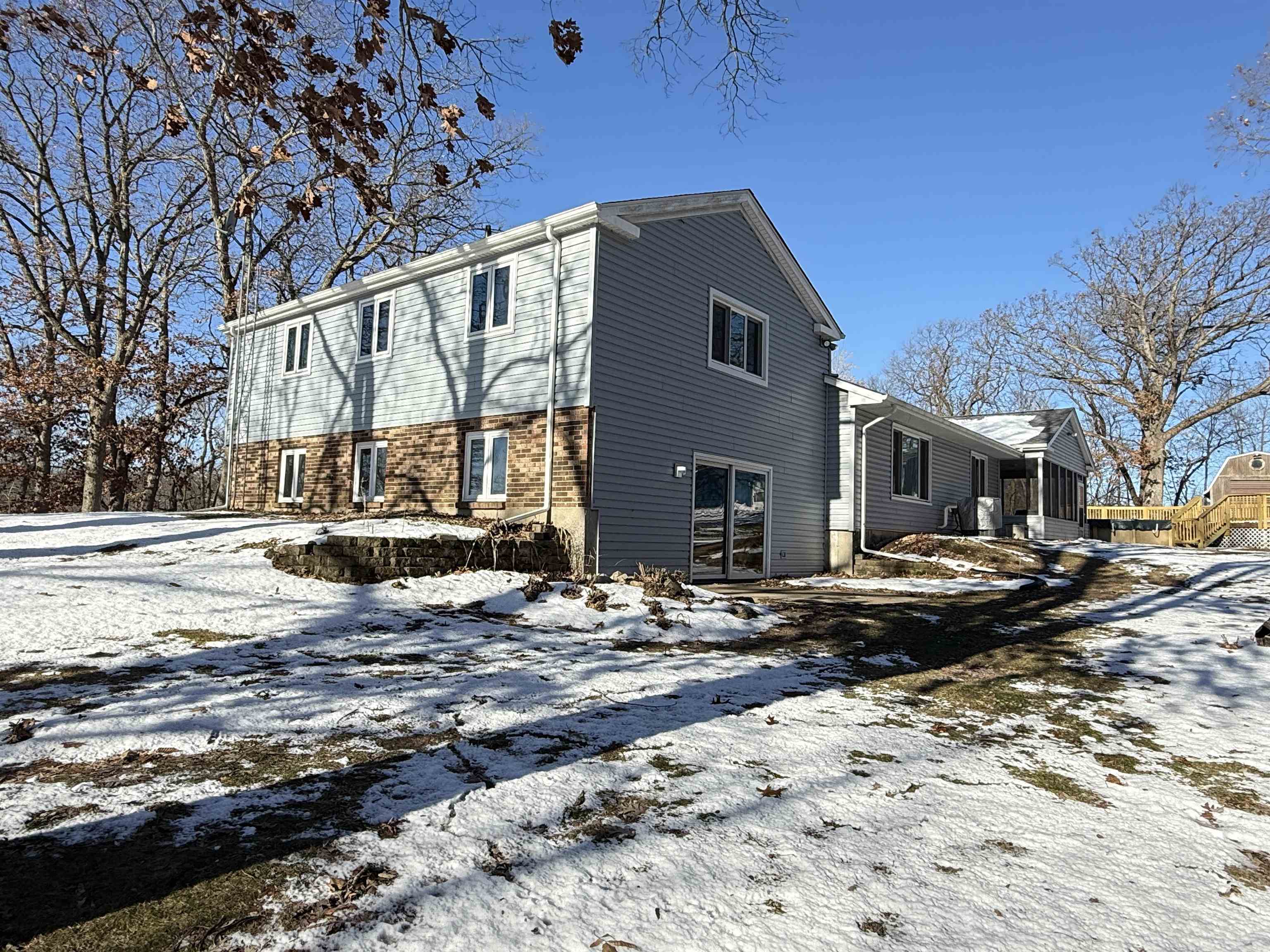 45 South Blackhawk Road Oregon, IL 61061 - Photo 36 of 42 a view of a house with a yard covered in snow
