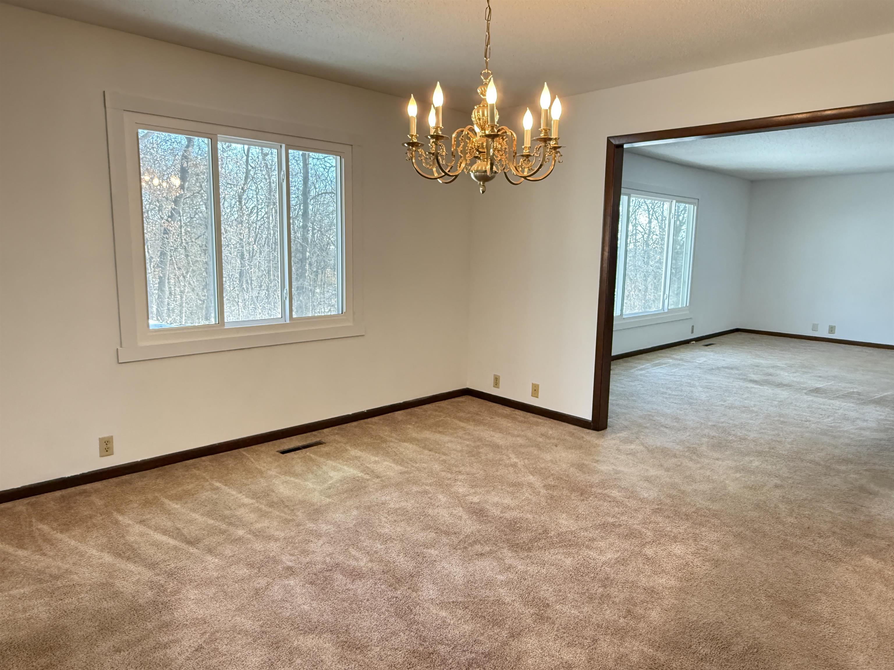 45 South Blackhawk Road Oregon, IL 61061 - Photo 6 of 42 wooden floor in an empty room with a window