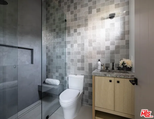 a view of a swimming pool with chairs