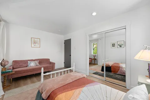 a bedroom with furniture and a couch