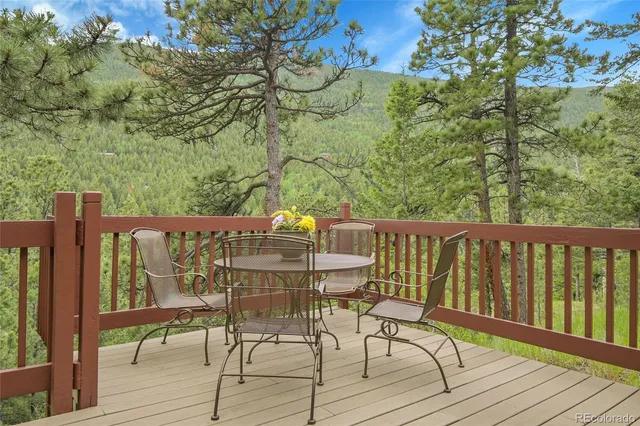 a view of a chairs on the roof deck