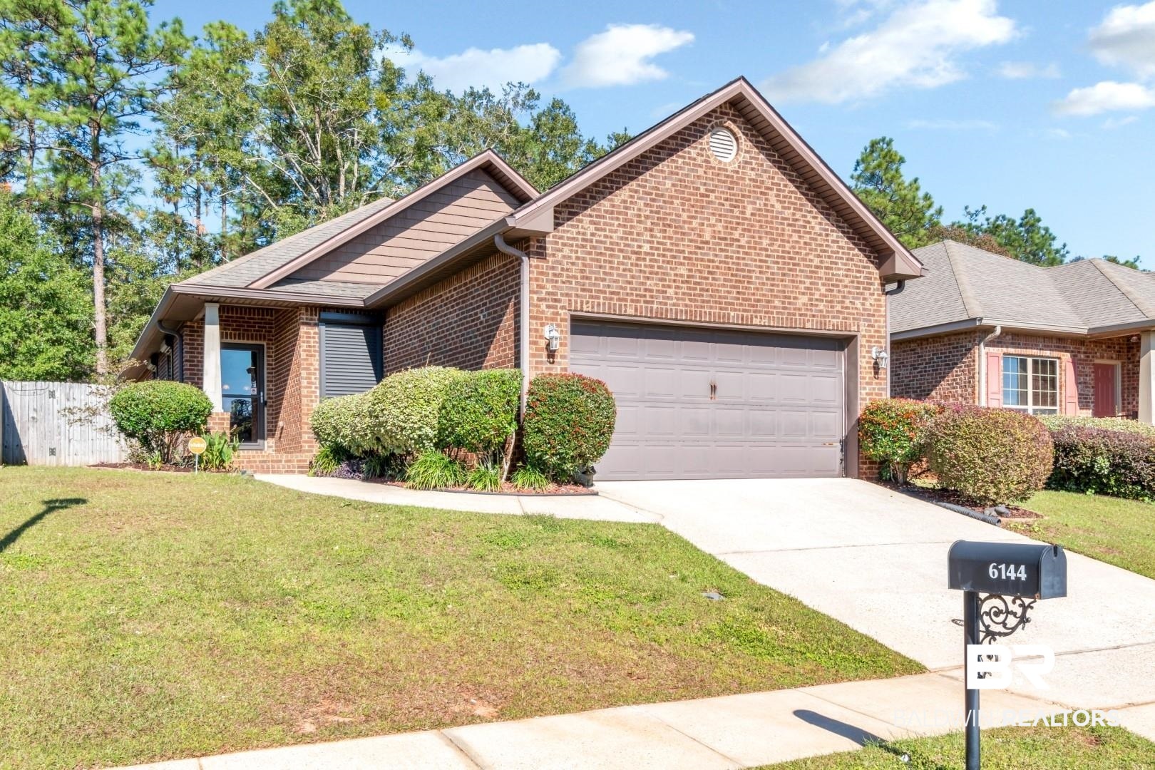 6144 Whitebark Drive Mobile, AL 36693 - Photo 1 of 33 View of front of property featuring a garage and a front yard