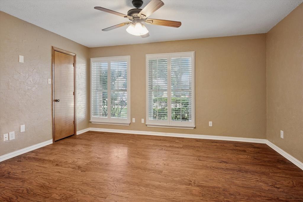 2027 Lavaca Trail Carrollton, TX 75010 - Photo 11 of 25 Primary Bedroom on the First Floor. Door pictured leads to closet