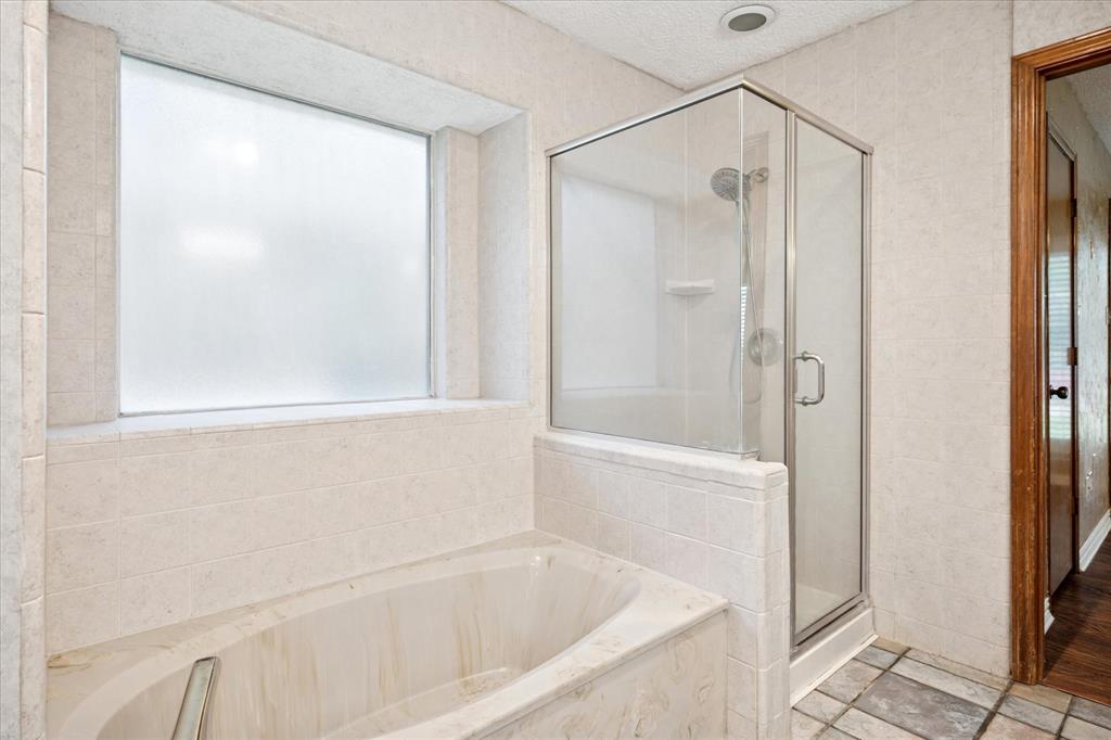 2027 Lavaca Trail Carrollton, TX 75010 - Photo 13 of 25 Primary Bath on the First Floor