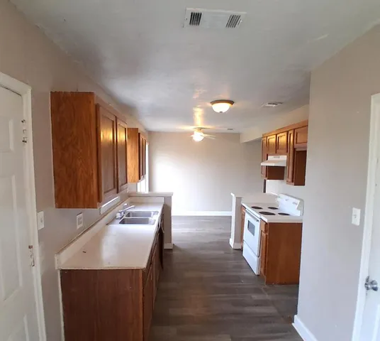 a room with furniture and mirror